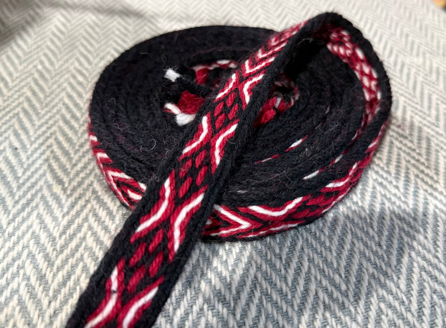 Red and black tabletwoven band